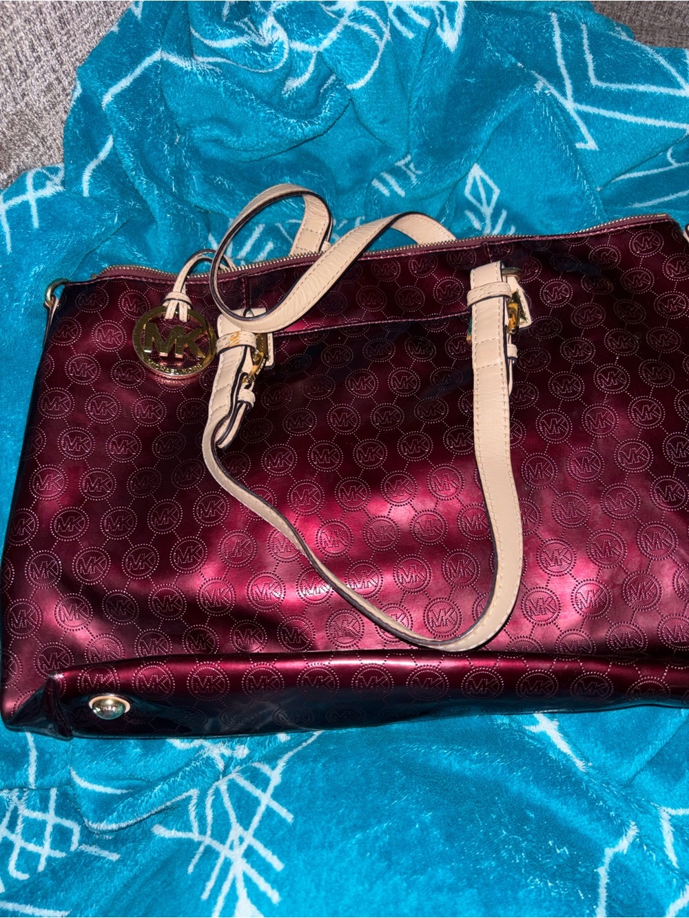 Michael Kors Metallic Burgundy Tote with Cream Handles and Gold Charm